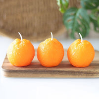 Set van 3 sinaasappelvormige kaarsen